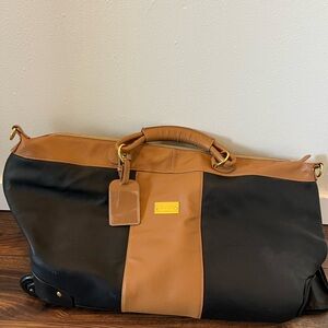 JM New York Stylish Black and Tan Travel Rolling Duffel Bag